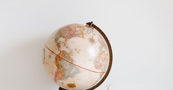 Storage Solutions - Retro toys and globe on cabinet in nursery room