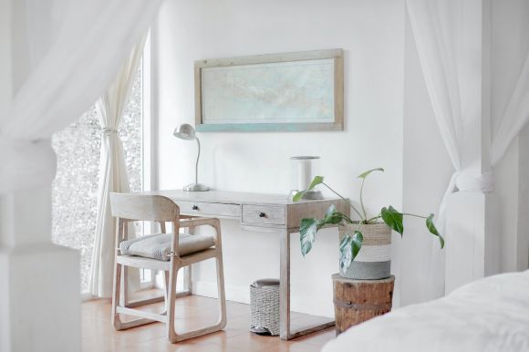 Minimalist Design - empty desk near curtain