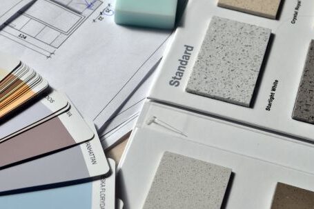 Renovation Tips - Gray Standard Color Book Near Green Eraser