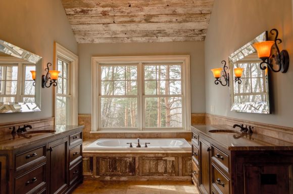 Bathroom Makeover - comfort room with white bathtub and brown wooden cabinets